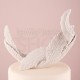 Cake topper con piuma bianca