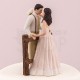 Cake topper con sposi in campagna