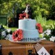Cake topper sposi in viaggio con bacio
