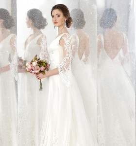 Abito da sposa in pizzo a maniche lunghe